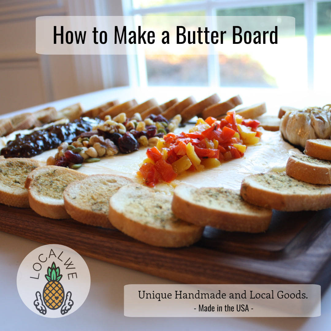 A butter board made on a walnut cutting board and sitting on a serving table