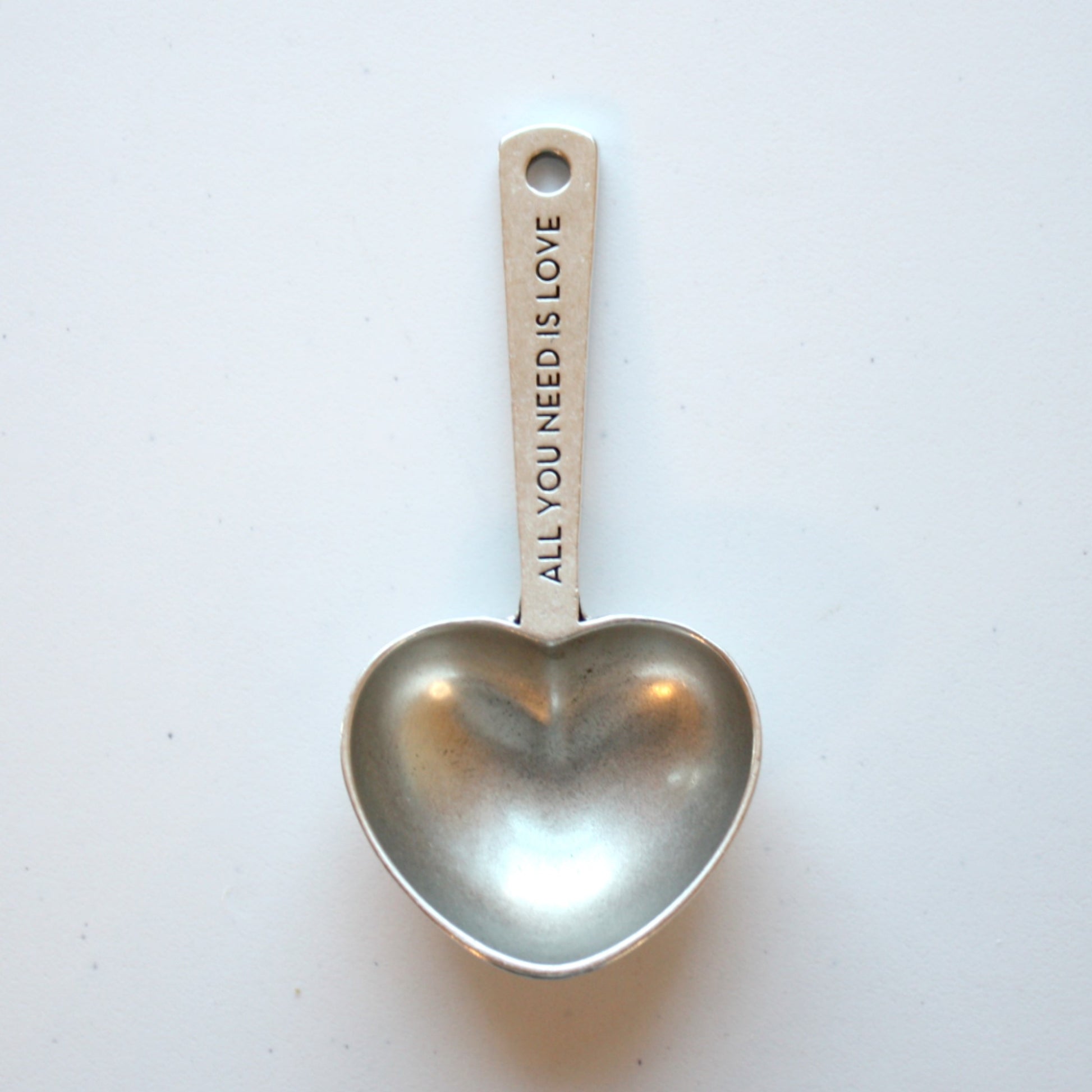 https://localwe.com/cdn/shop/products/pewter2tablespoonheartcoffeescoop1.jpg?v=1666905637&width=1946